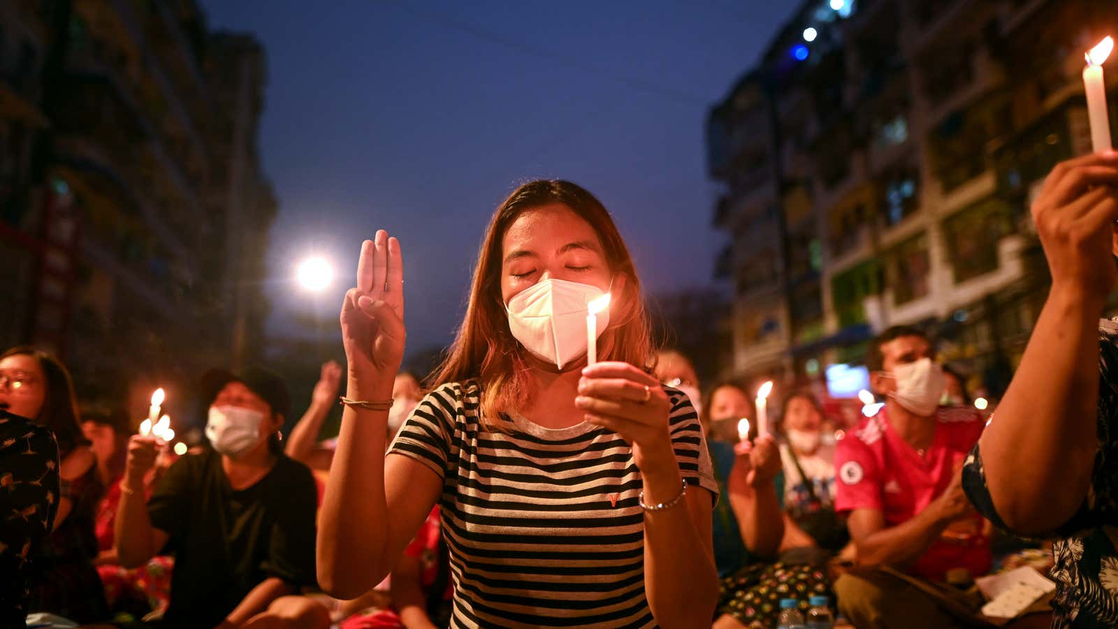 People take part in an anti-coup protest in Myanmar.