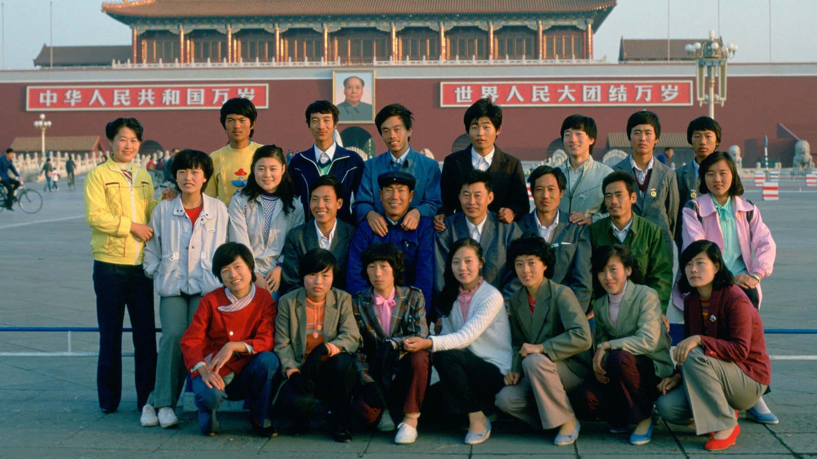 Students pose in Tiananmen Square about six months after the crackdown on protesters in the plaza in 1989.