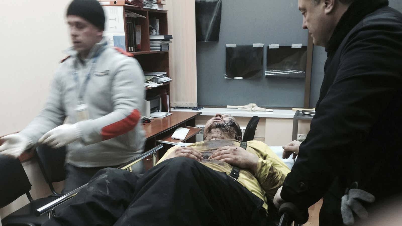 Dmytro Bulatov in the hospital after resurfacing.