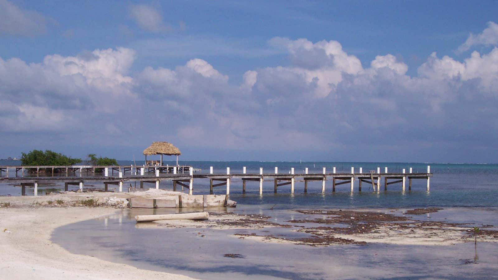 The stolen money was meant for a beachfront spread in Belize.