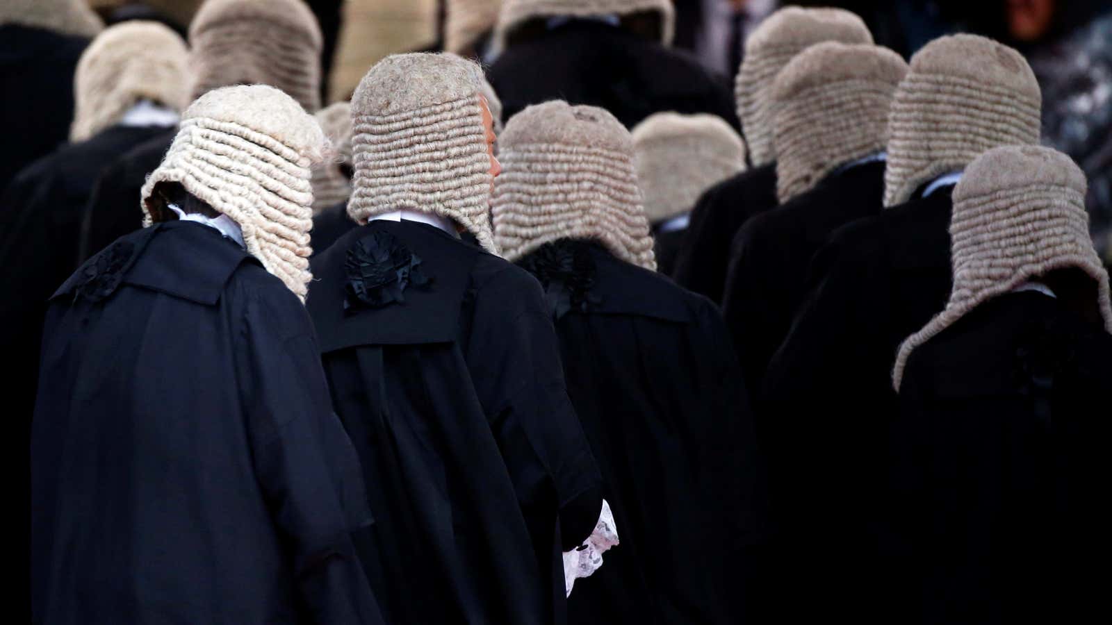 Judges wearing wigs attend a ceremony to mark the beginning of the legal year in Hong Kong, China January 8, 2018. Picture taken January 8,…