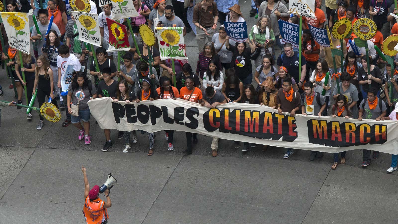 Activists lead a march of tens of thousands through Midtown, New York on Sunday.