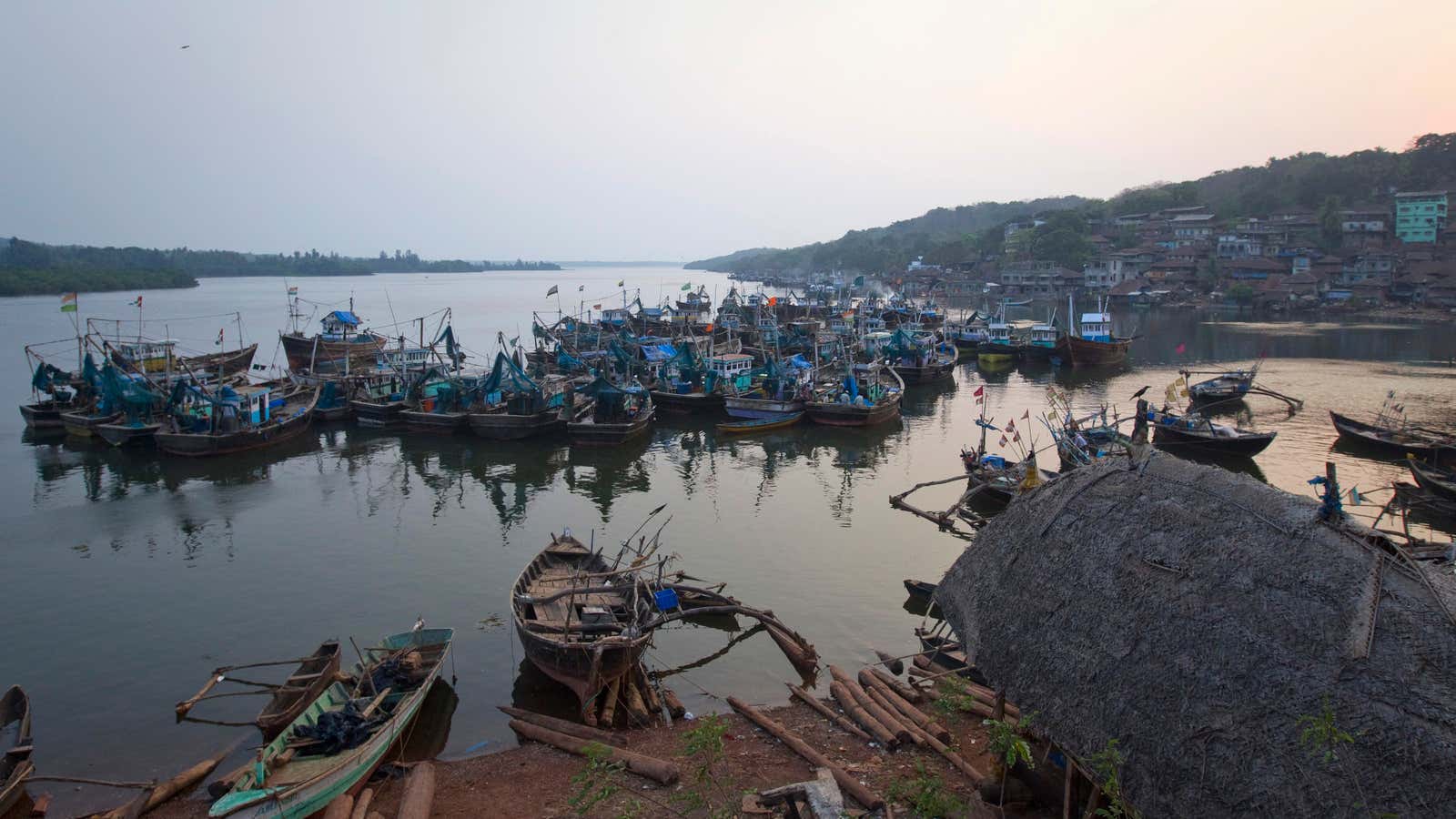 Fishing boats are seen moored in a harbour at Sakhari Nate village near the proposed site of the Jaitapur nuclear plant.