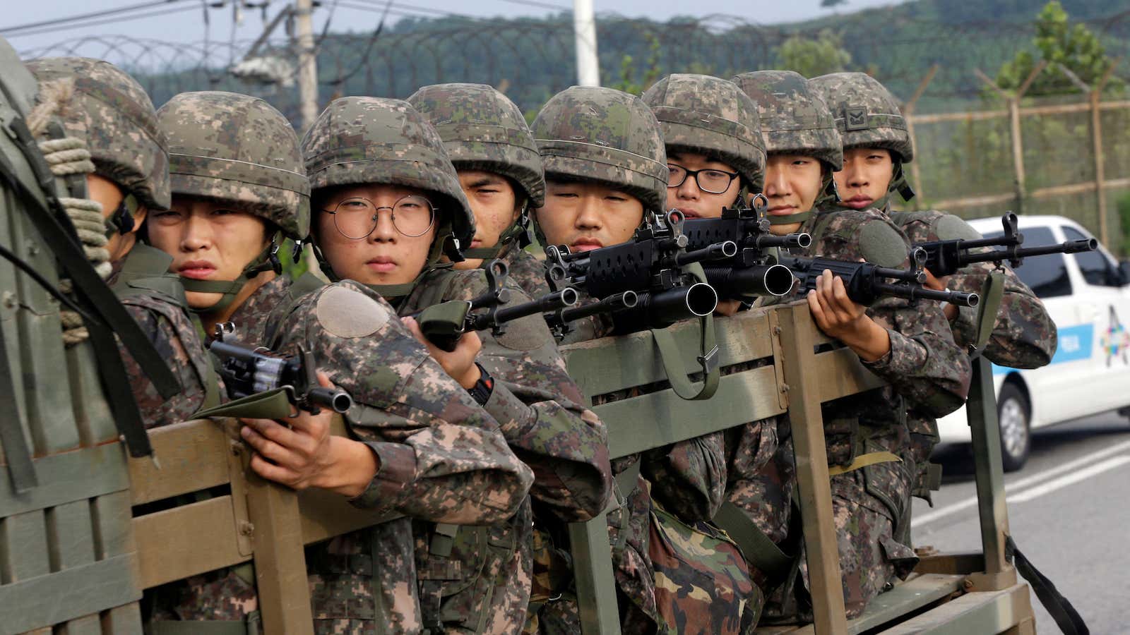 South Korean army soldiers ride on a truck near the demilitarized zone that divides the two Koreas.