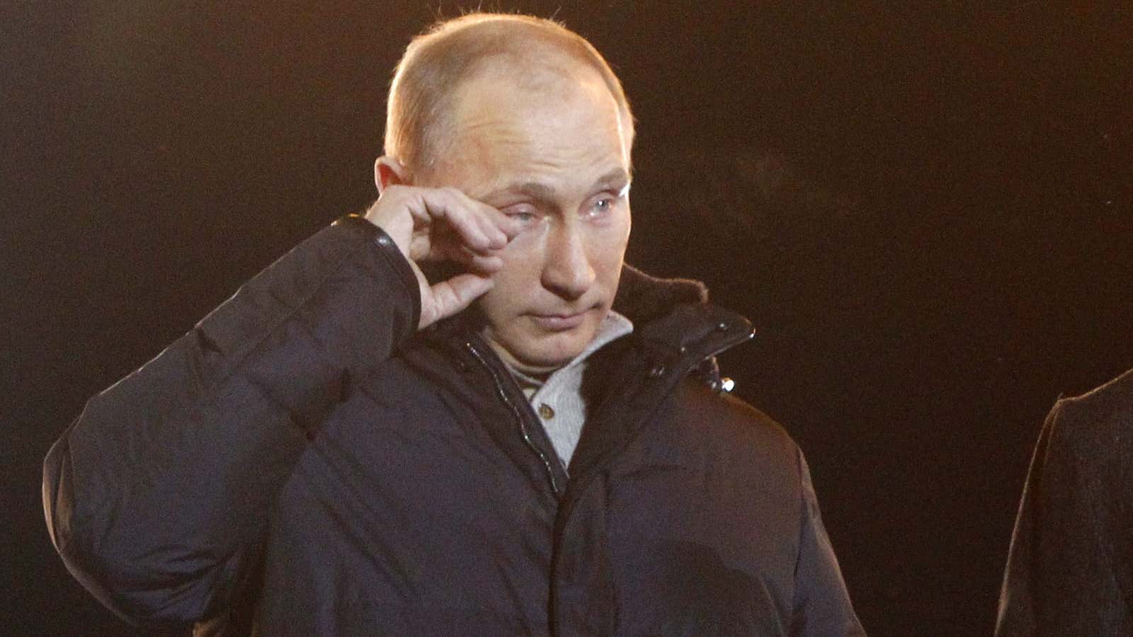 Putin wipes away a tear after winning the 2012 election.