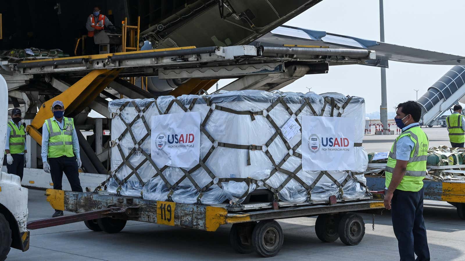 A U.S. Air Force aircraft is seen on the tarmac after landing with coronavirus disease (COVID-19) relief supplies from the United States at the Indira…