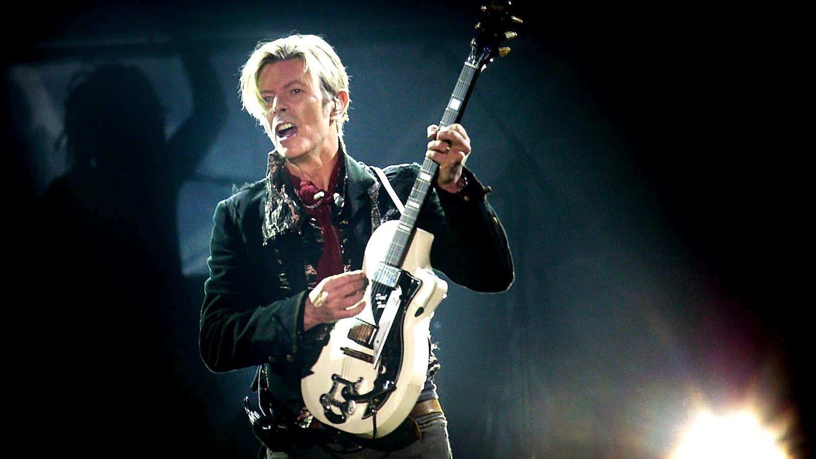 Rock legend David Bowie performs on stage at Forum, in Copenhagen, Denmark, Tuesday, Oct. 7, 2003.