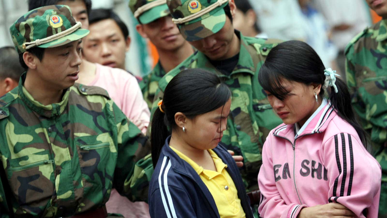 Two underage workers are taken from a factory in China in 2008, but child labor there has not stopped.