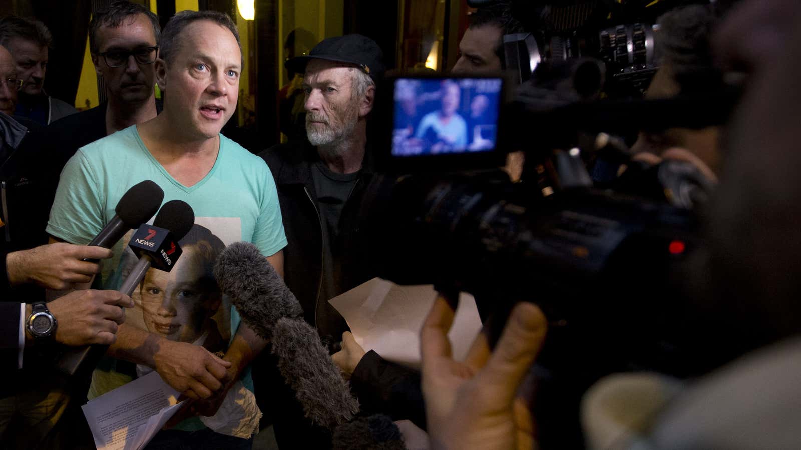 Peter Blenkiron, a victim of priestly sex abuse in Australia, talks with reporters in Rome.