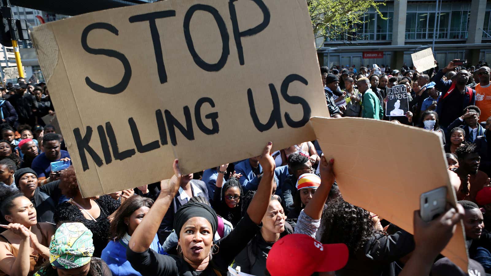 Demonstrators gather outside the Cape Town International Convention Centre during a protest against gender based violence, at WEF Africa, in Cape Town, South Africa, Sep. 4, 2019.