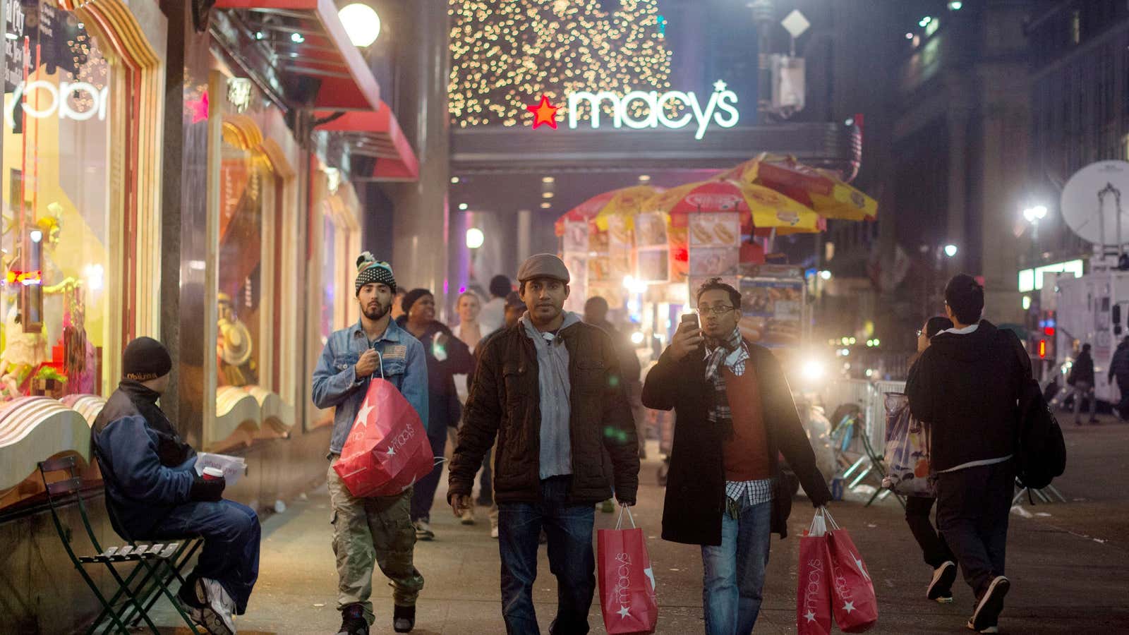 Holiday shoppers leave Macy’s.