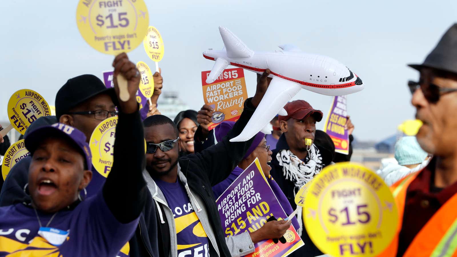 Airport workers in Detroit demonstrate for higher wages.