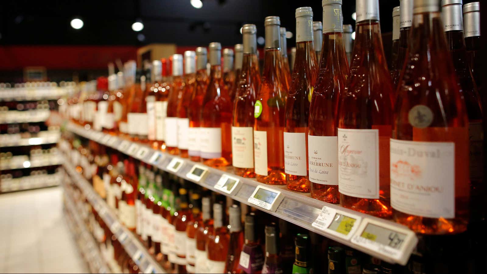 Bottles of rose wine are displayed for sale in a supermarket in Vertou, near Nantes, France, June 20, 2017.