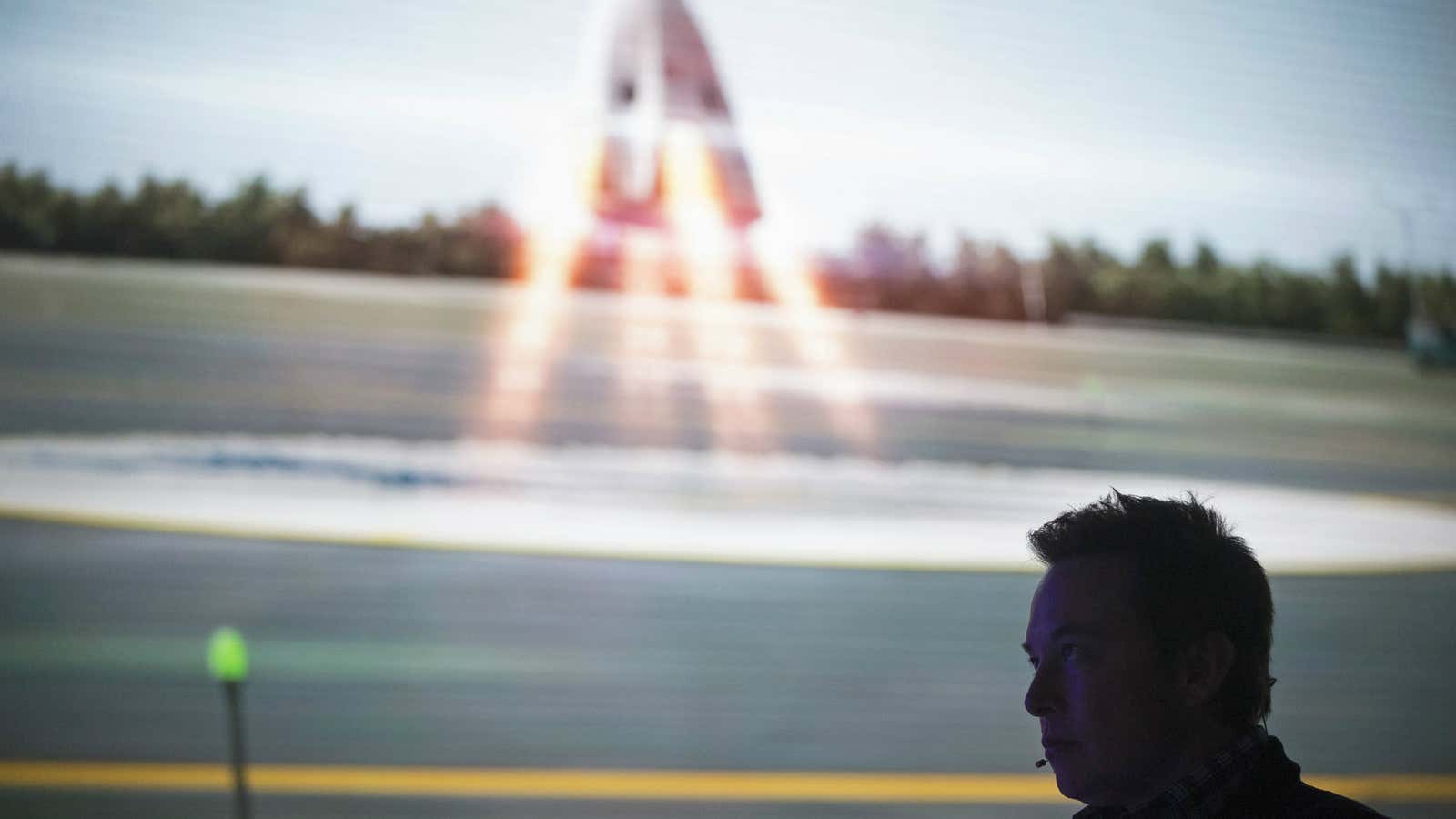 SpaceX CEO Elon Musk watches a video after unveiling the Dragon V2 spacecraft in Hawthorne, California May 29, 2014. Space Exploration Technologies, or SpaceX, on…