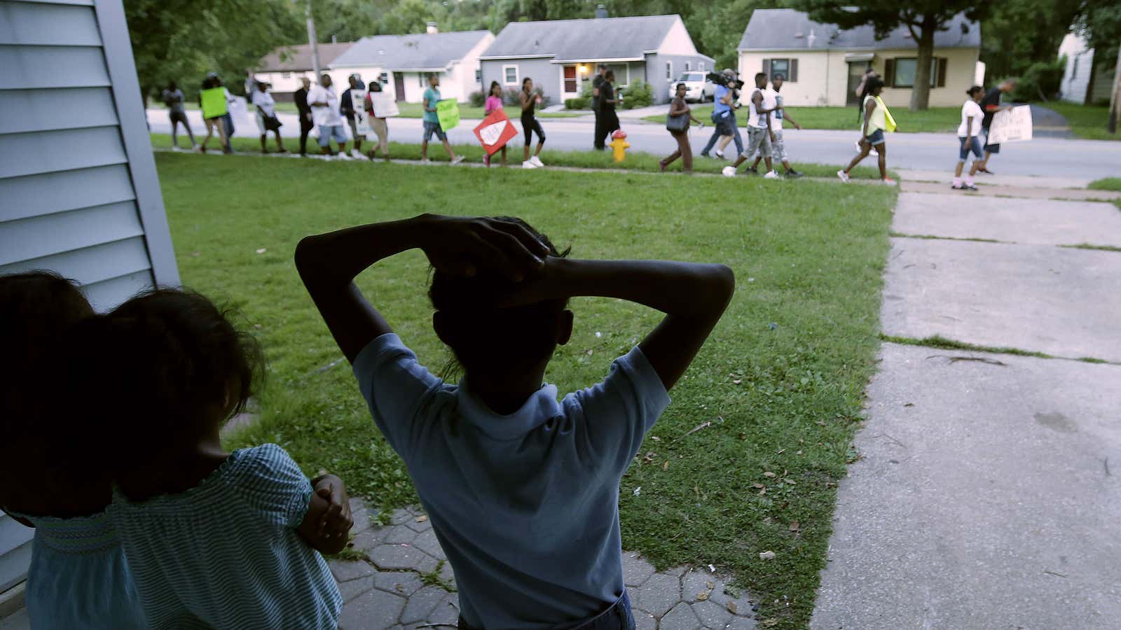 Just watching the protesters—and the world—go by.