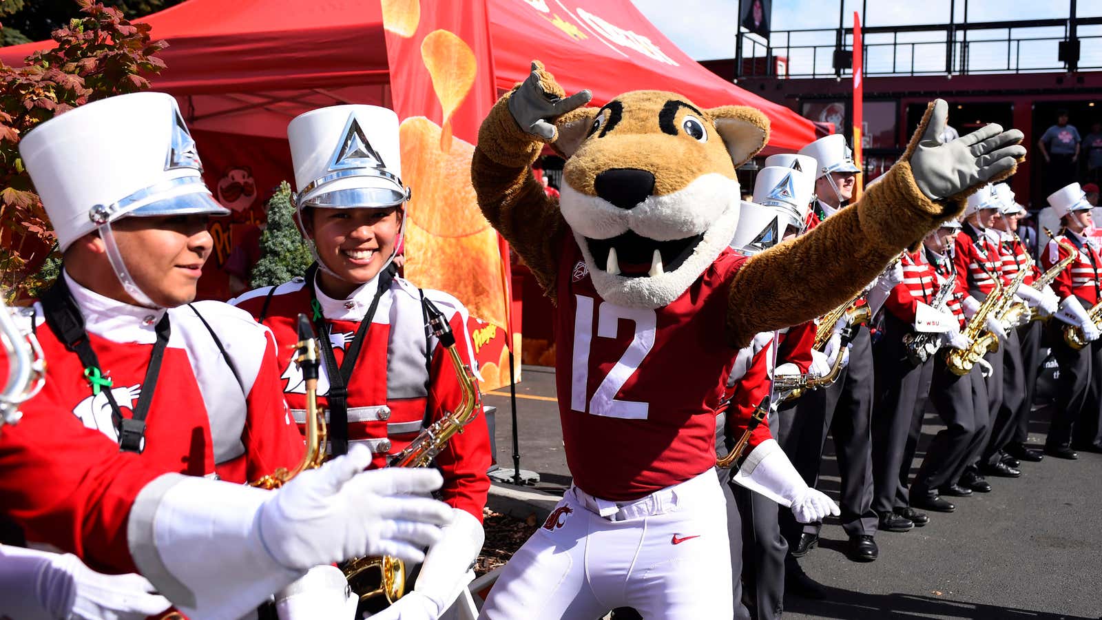 Sep 29, 2018; Pullman, WA, USA; Washington State Cougars mascot Butch dances with the Cougar marching band outside Martin Stadium before a football game against the Utah Utes.