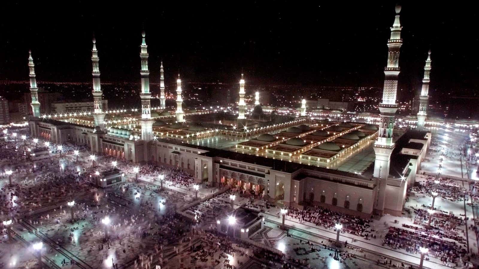 Pilgrims leave the Prophet’s mosque in Medina, Saudi Arabia, in this 2001 photo.