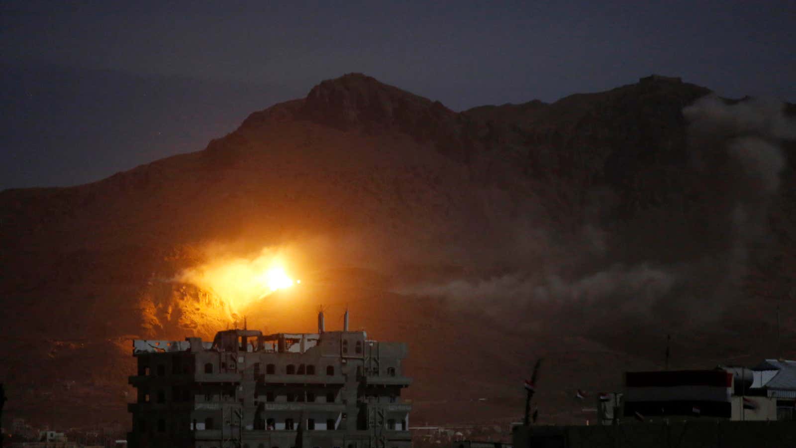 An explosion from a Saudi-led airstrike in Sanaa, Yemen.