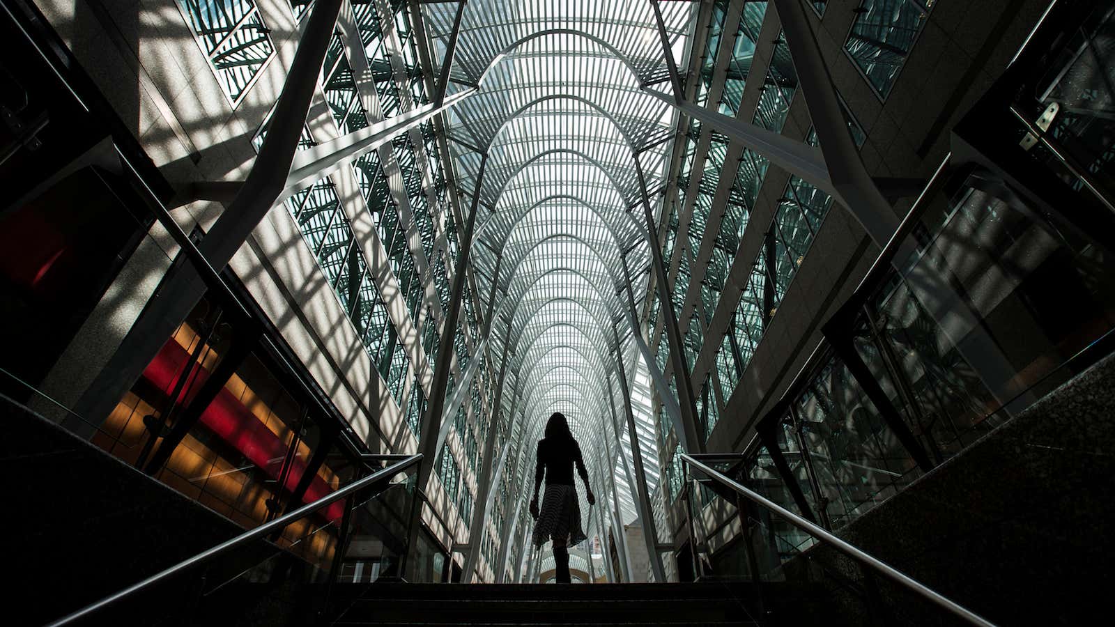 A woman walks through Brookfield Place off Bay Street, on the day of their annual general meeting for shareholders in Toronto, May 7, 2014. Brookfield…