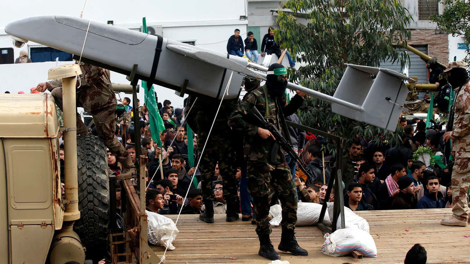 Hamas militants display a drone they constructed in 2014.