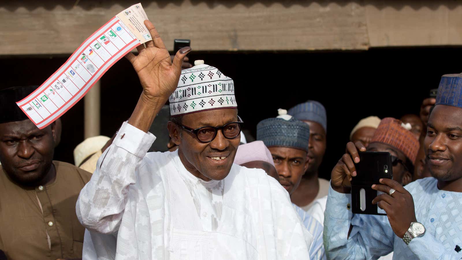 A rare smile from former dictator Buhari.