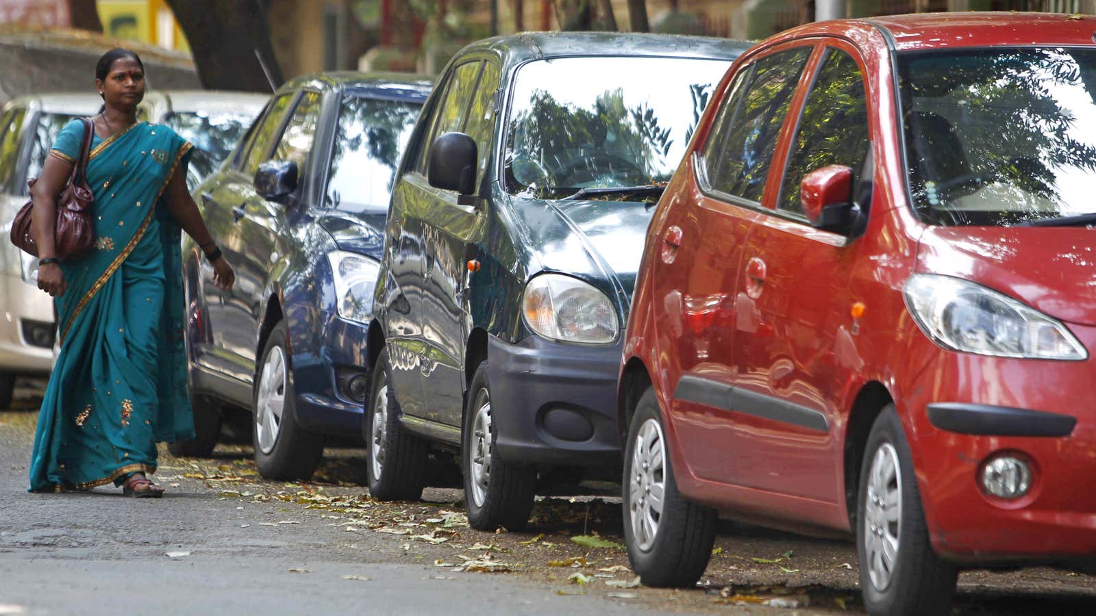 Facing high interest rates and rising fuel costs, India’s potential car-buyers are parking their money elsewhere.