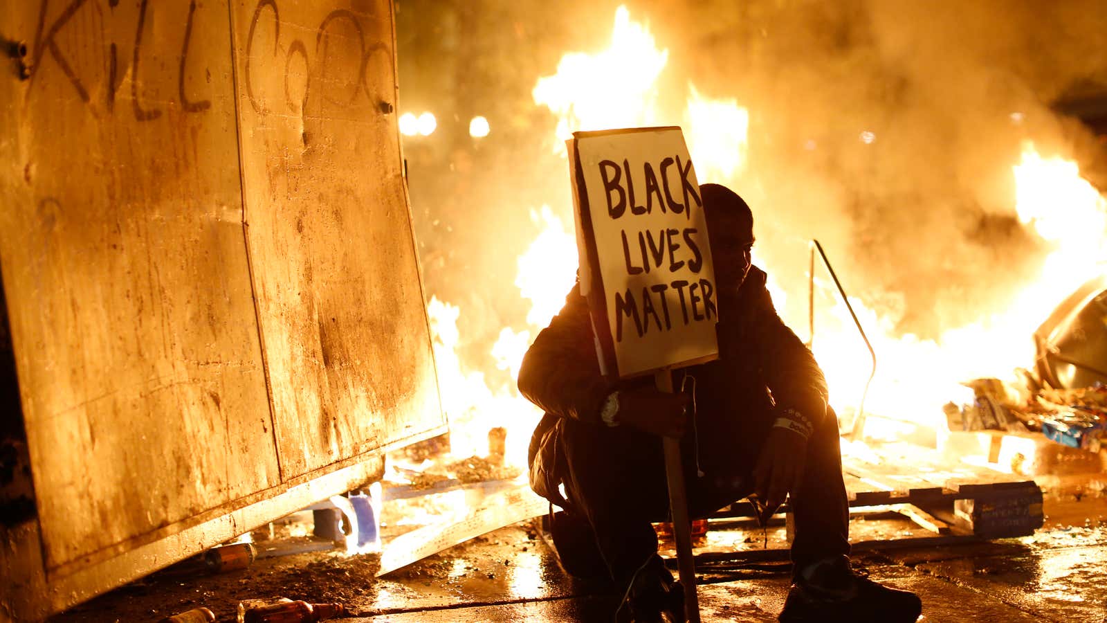 The rallying cry on this sign, from a Ferguson-related protest in Oakland, California, also became a viral hashtag.