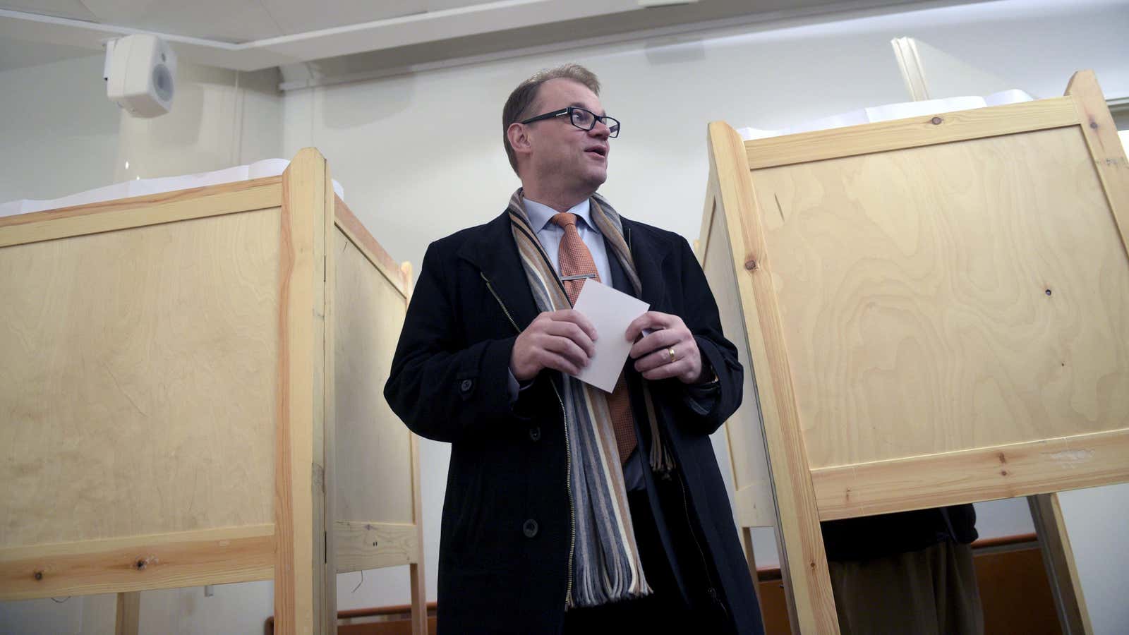 Juha Sipila, leader of Finnish Centre Party, votes in pre-elections.