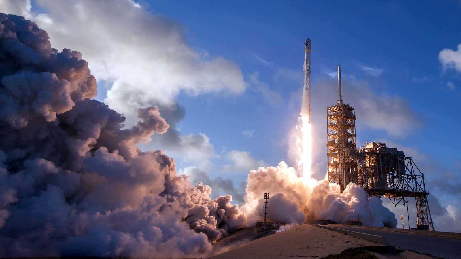 A SpaceX Falcon 9 launches a satellite at Cape Canaveral in April 2017.