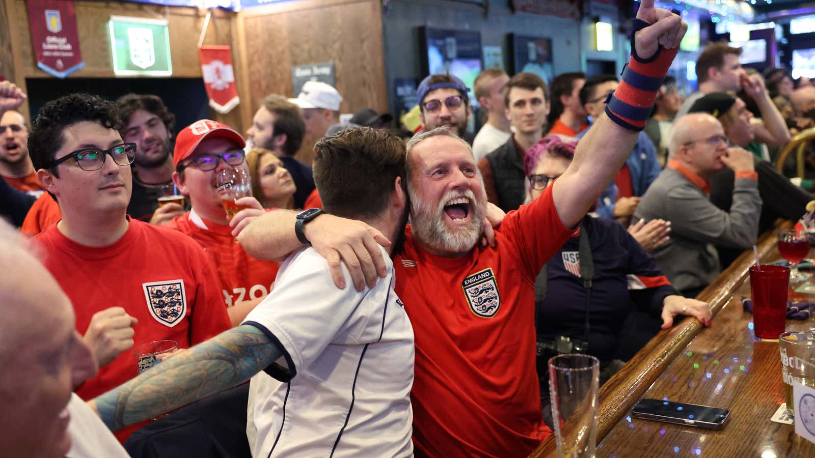 Evenings spent in the pub cheering on the English football team in Qatar might have stopped the UK from entering a recession.