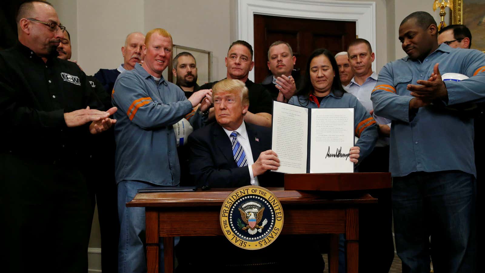 The signing of a presidential proclamation placing tariffs on steel and aluminum imports on March 8.