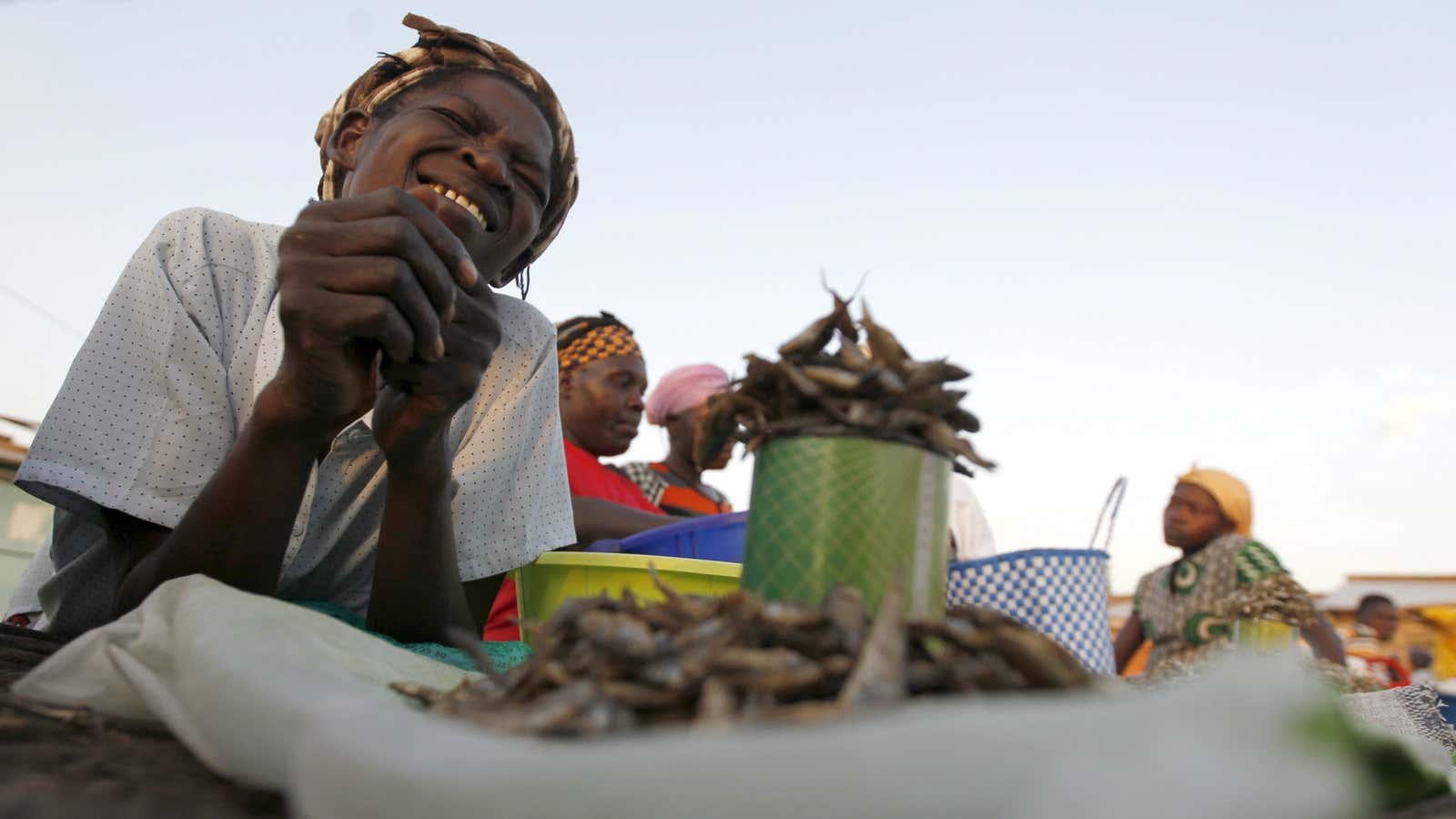 This Kenyan fishmonger is a typical member of the local informal sector.