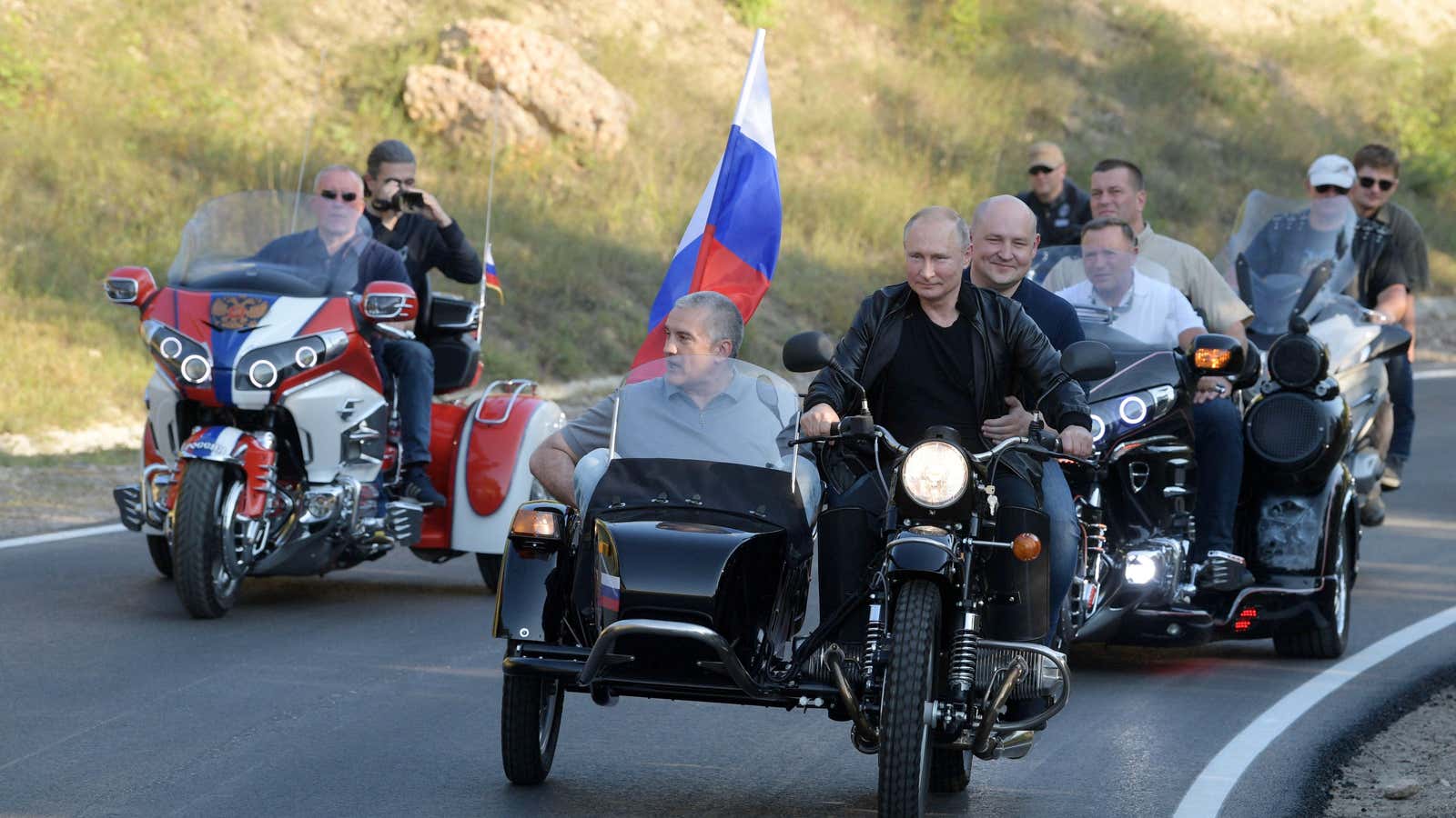 Russian president Vladimir Putin motorcycles through Sevastopol, Crimea.