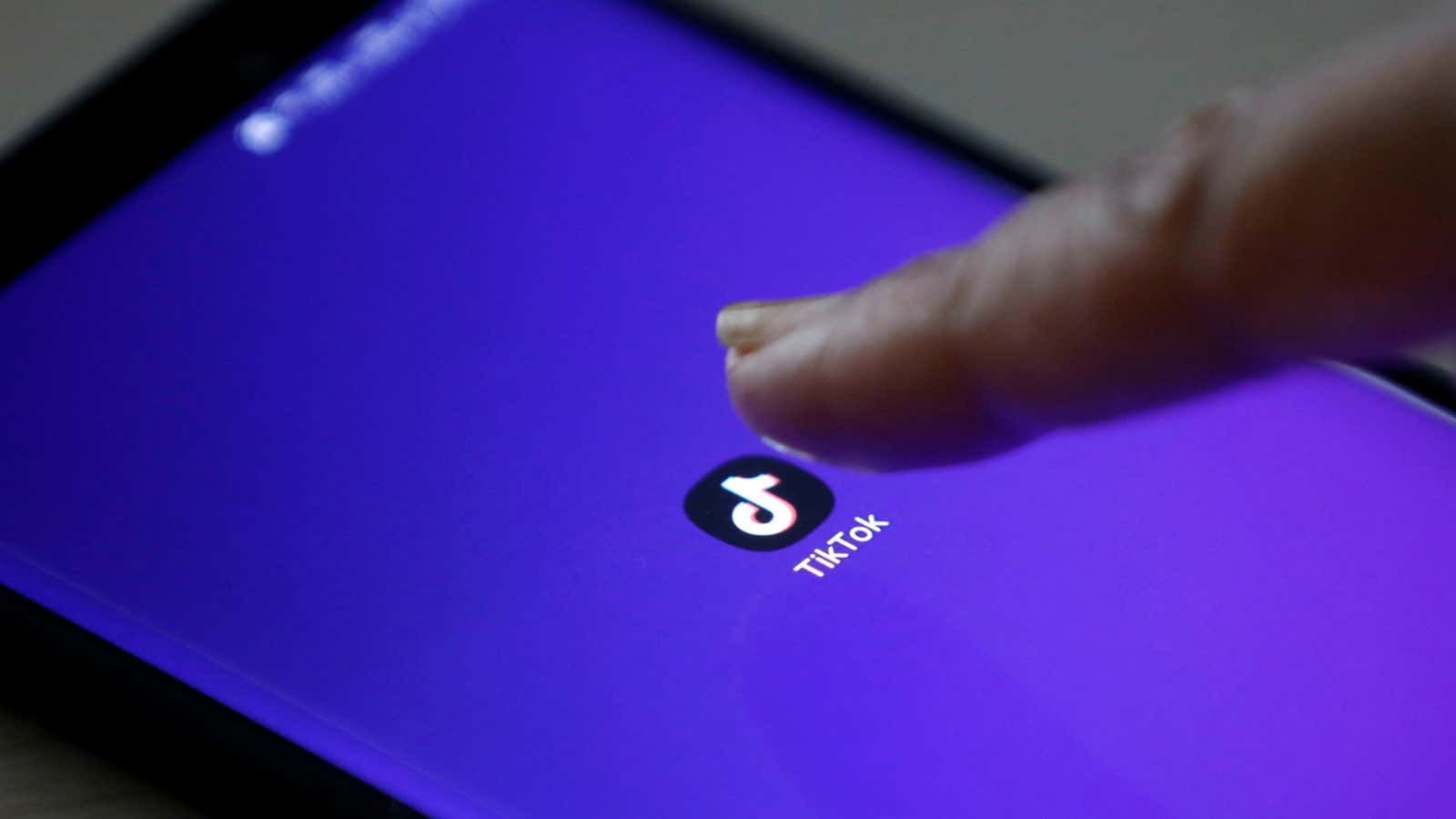 FILE PHOTO: The logo of TikTok application is seen on a mobile phone screen in this picture illustration taken February 21, 2019. REUTERS/Danish Siddiqui/Illustration/File Photo