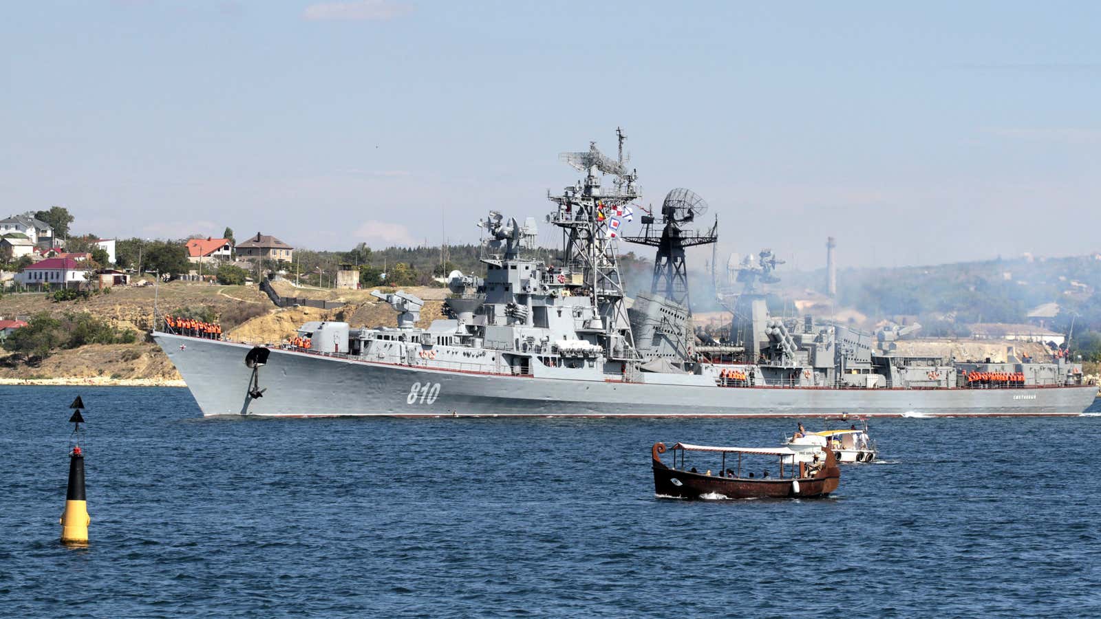 A Russian warship fired warning shots at a Turkish fishing vessel