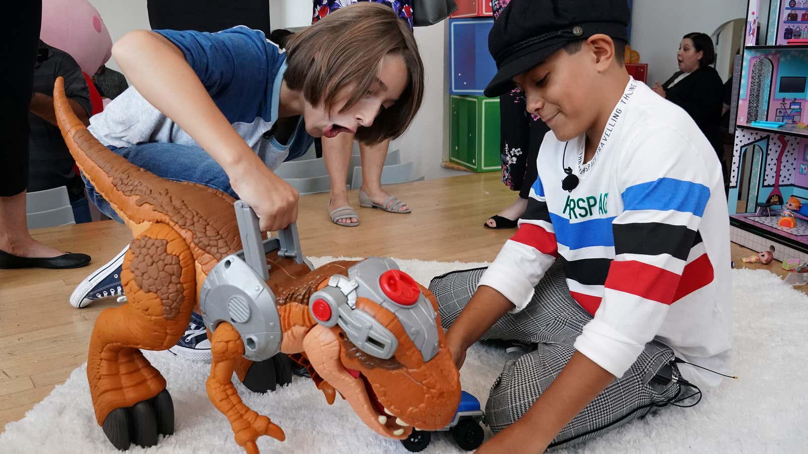 Children play with toys during a Walmart event to announce new toys for the holiday season in New York City, New York, U.S., August 30, 2018. REUTERS/Carlo Allegri – RC167CEFBE70