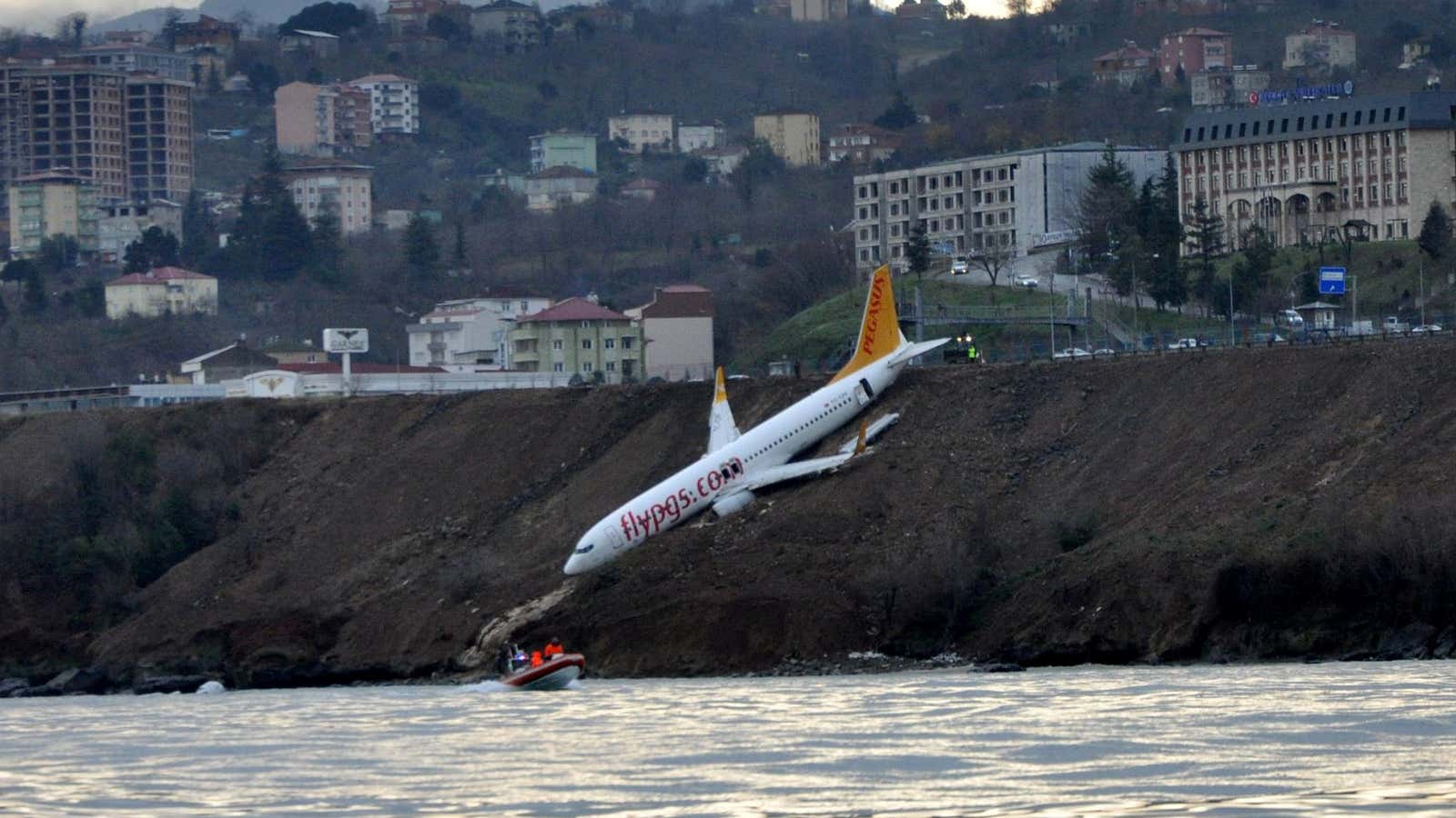 A Pegasus Airlines aircraft is pictured after it skidded off the runway at Trabzon airport by the Black Sea in Trabzon