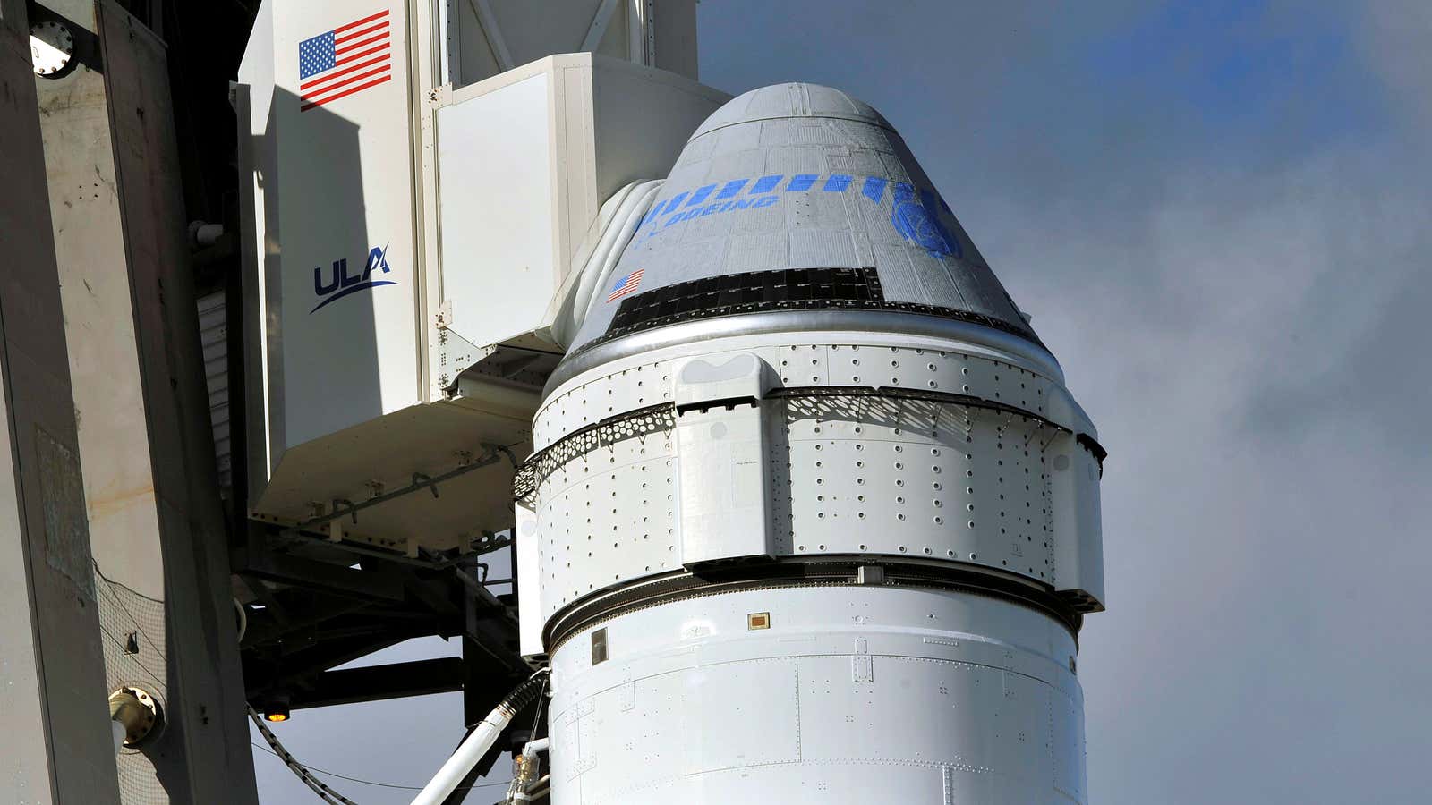 The Boeing Starliner on top of its rocket booster before launch.