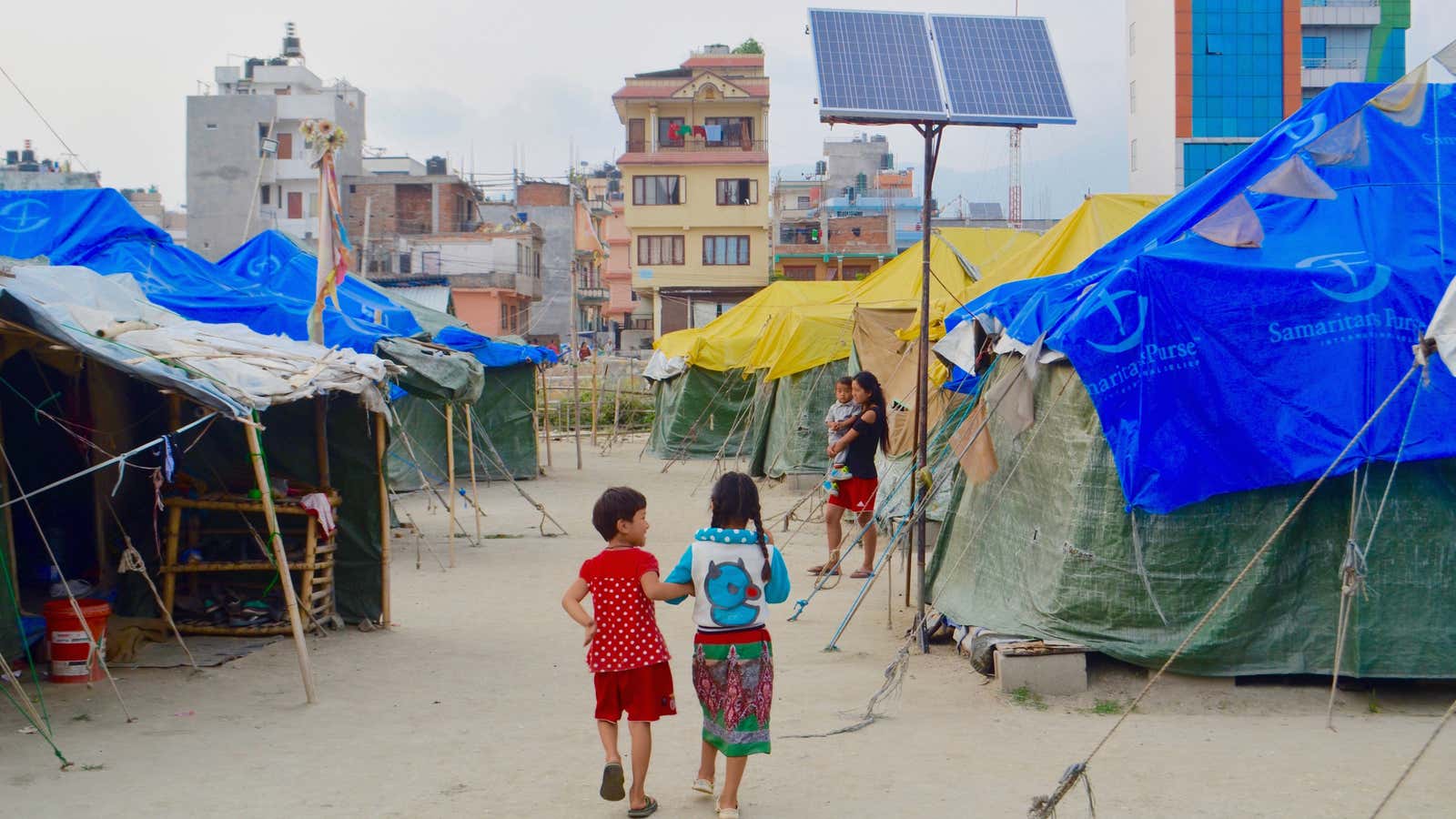 Camp Hope is a temporary home to 350 people, with 4-5 families per tent.