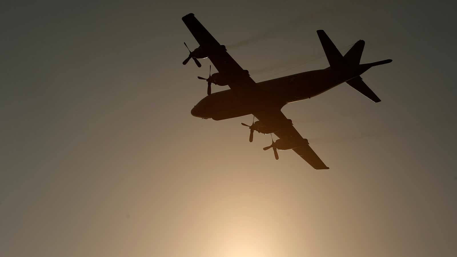 A US Navy aircraft flies over Incirlik airbase in Turkey.