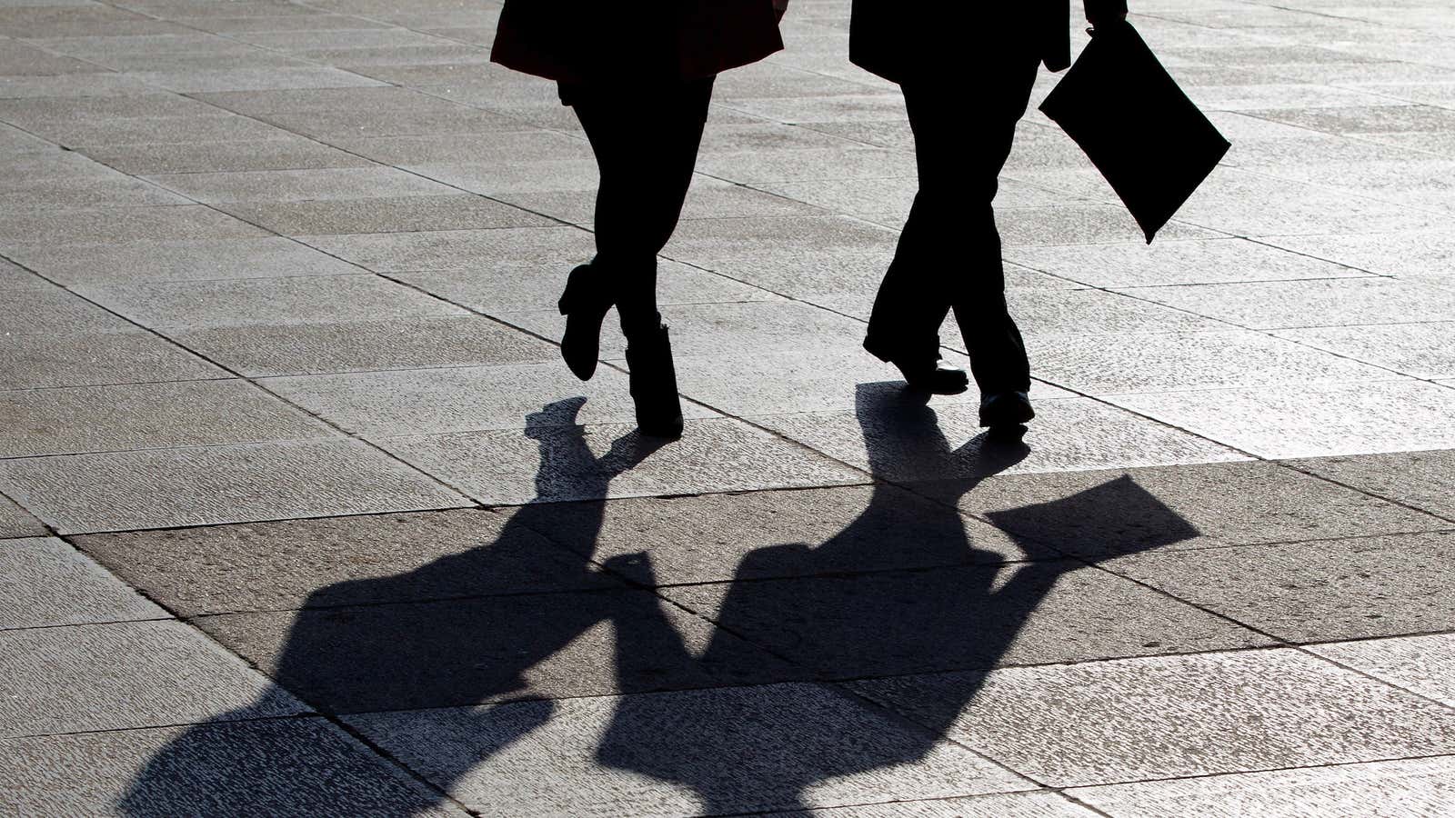 Delegates cast their shadow on the floor as they arrives to attend a plenary session of the National People’s Congress held at the Great Hall…