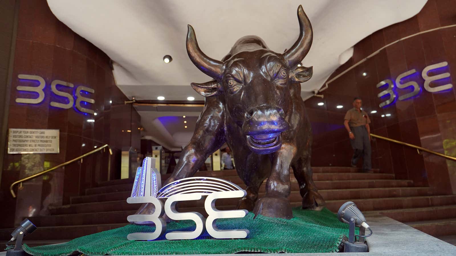 A man walks out of the Bombay Stock Exchange (BSE) building in Mumbai, India, February 28, 2020.