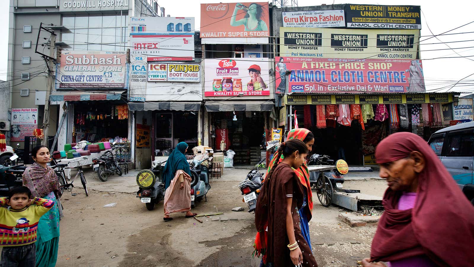 Stores like these in Jalandhar, in the state of Punjab, are still where most Indians do their shopping.