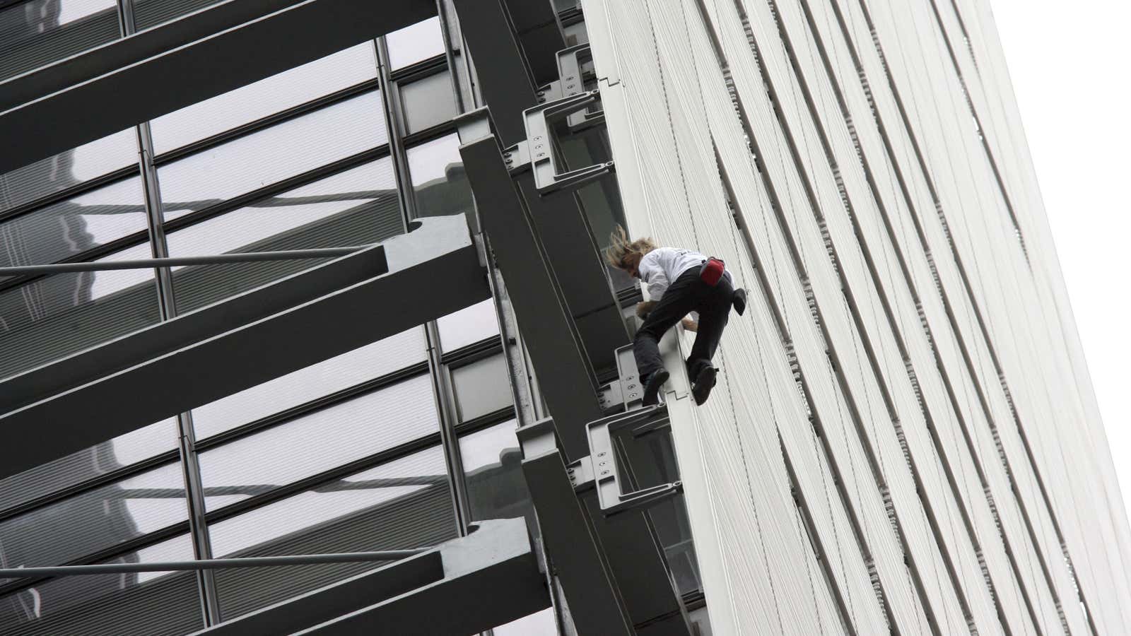 Alain Robert, known as the French Spiderman, scaling the Times Building in 2008.