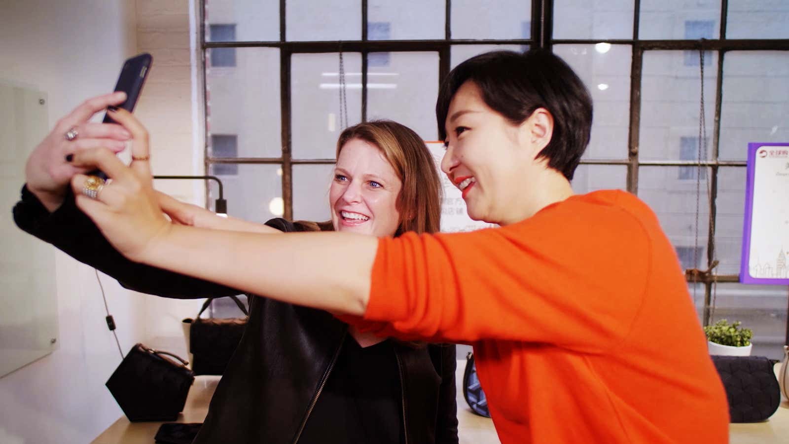 Alibaba helped Sandy Friesen, left, launch her handbag line in China.