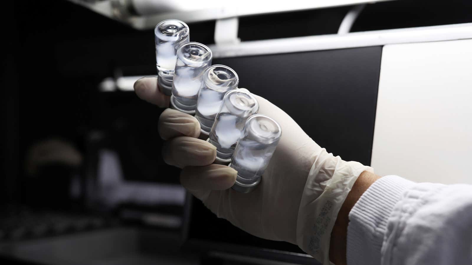 An employee inspects vials containing CoronaVac, Sinovac Biotech’s vaccine against the coronavirus disease (COVID-19), at Butantan biomedical center in Sao Paulo, Brazil January 12, 2021.…