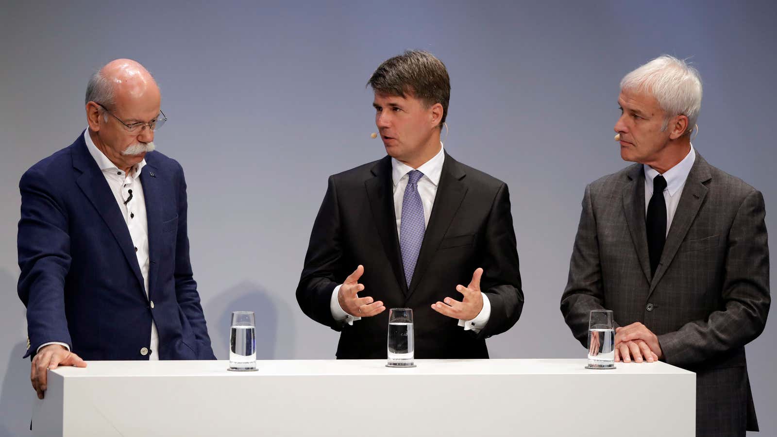 From left, Daimler boss CEO Dieter Zetsche, BMW CEO Harald Krüger, and VW CEO Matthias Müller.