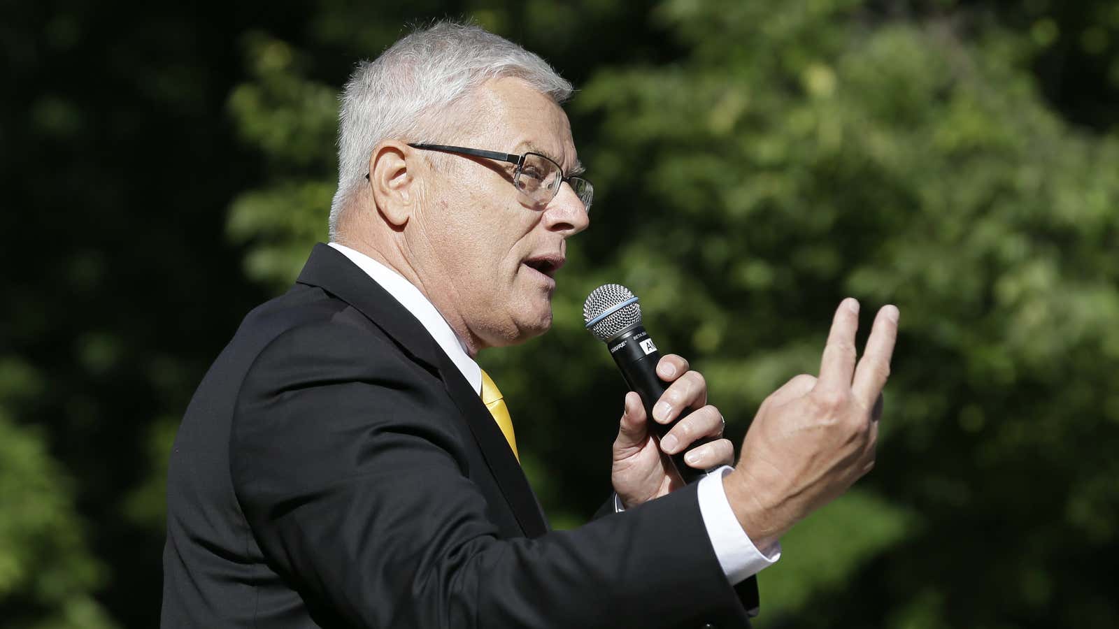 John McDowell, of Rapid City, South Dakota, competes in the Iowa State Champion Auctioneer Contest at the Iowa State Fair, Tuesday, Aug. 12, 2014, in Des Moines, Iowa. The fair runs through Aug. 17th. (AP Photo/Charlie Neibergall)