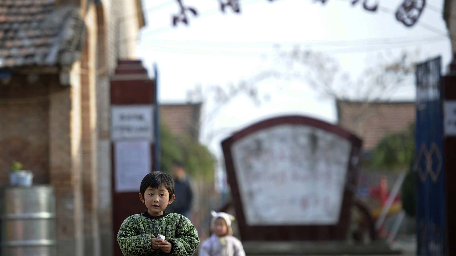 Chinese students in front of a kindergarten in Gansu province.