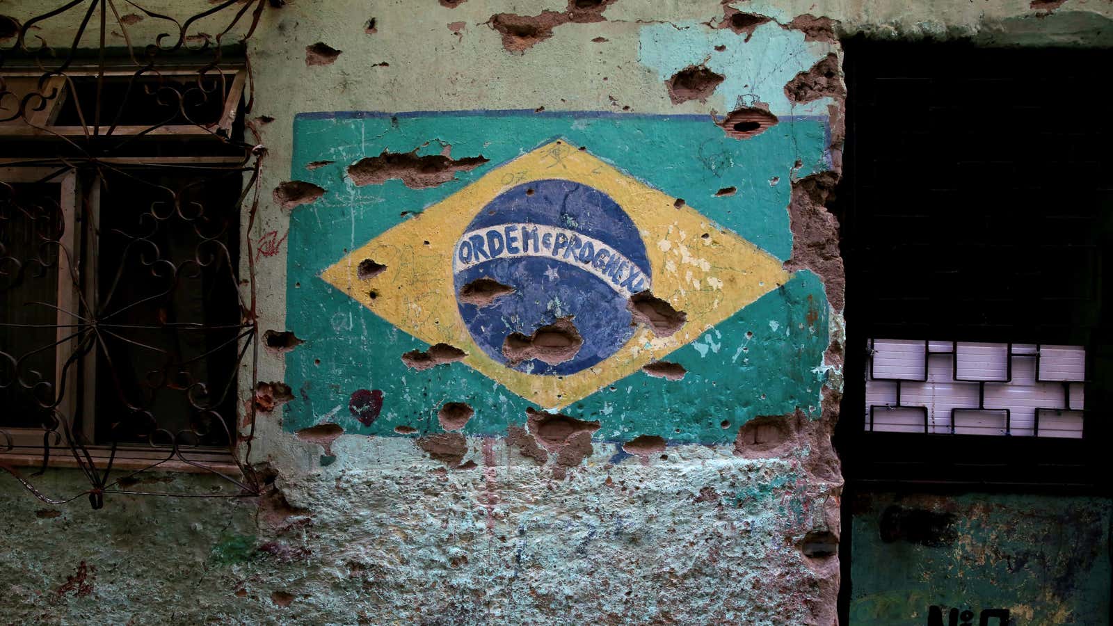 A Brazilian flag damaged by bullets in Rio’s Jacarezinho slum.